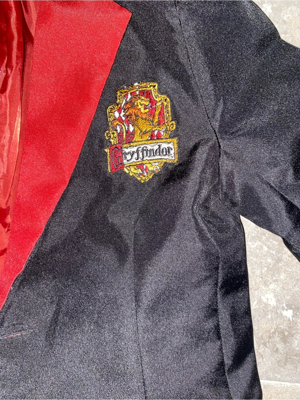 Black Gryffindor-Inspired Suit costume with Red Accents and Striped Tie